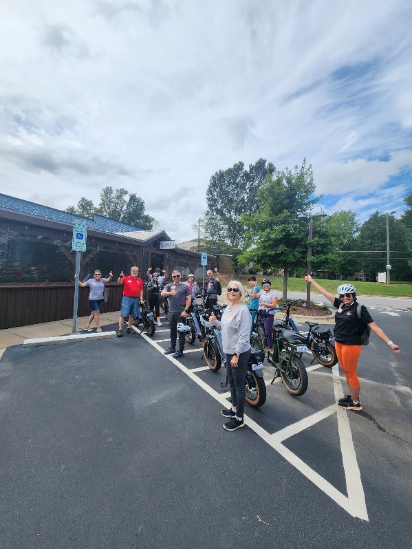 Guests enjoying the Raleigh area food and drinks e-bike tour