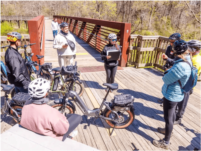Guests gathered during a Triangle Adventures e-bike tour